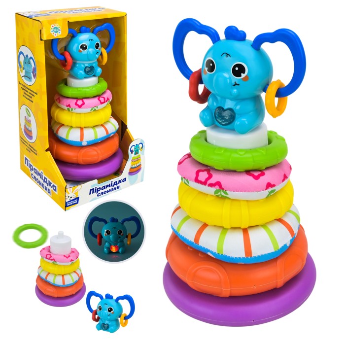 Пірамідка «Сонячний зайчик» 23х13 см музична зі світлом, тканевими та пластиковими кільцями, на батарейці, у коробці 15,5х14,1х26,8 см.